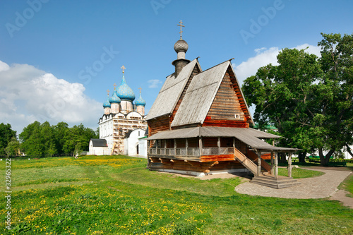 Photo: Wooden church Nikola's and Nativity Cathedral in Suzdal Kremlin. Wooden church Nikola's and Nativity Cathedral in Suzdal Kremlin.