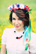 pretty woman in the Ukrainian national clothes in the park
