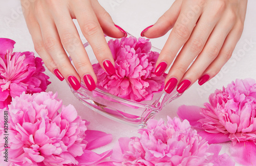 Photo: Body care: manicure pampering with pink flowers Body care: manicure pampering with pink flowers