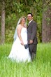 Bride and Groom in Field