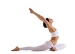 Yong woman doing yoga asana - pigeon pose