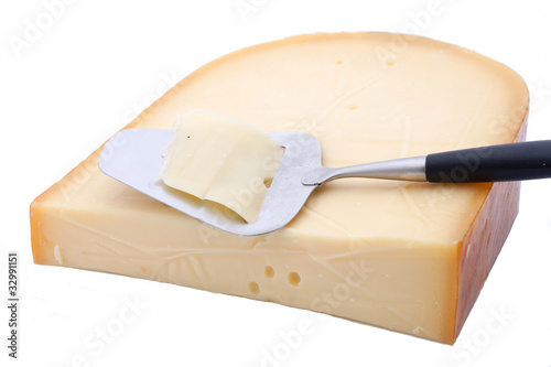 Photo: gouda cheese with slicer gouda cheese with slicer