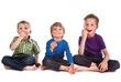 three kids eating sweets three kids eating sweets