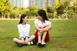 asian mother and daughter having a conversation