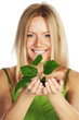 plant in blonde hands