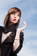 young elegant girl with a cigarette
