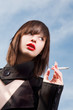 young elegant girl with a cigarette