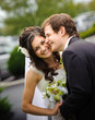 Smiling bride and groom