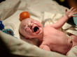 Crying newborn baby in the hospital