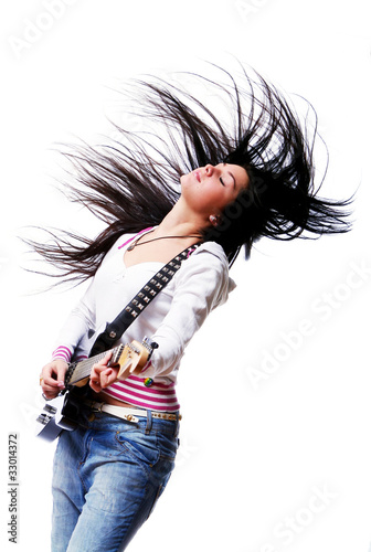 Foto: Beautiful woman with electro guitar Beautiful woman with electro guitar