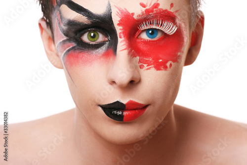 Photo: Beautiful man with abstract make up Beautiful man with abstract make up