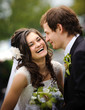 Laughing bride and groom