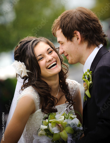 Photo: Laughing bride and groom Laughing bride and groom