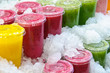 Fresh fruit juices on the market stall in ice Fresh fruit juices on the market stall in ice