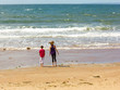 brother and sister at the beach
