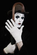 mime holding a walking-stick in his hand mime holding a walking-stick in his hand