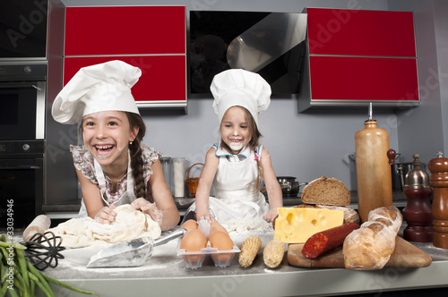 Photo: two little girl cook two little girl cook