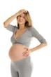 offended pregnant woman in gray suit