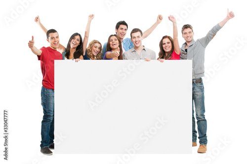 Photo: Happy people with white board Happy people with white board