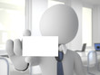 Businessman in office showing a blank business card Businessman in office showing a blank business card