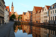 Jan van Eyckplein: old town of Bruges in Belgium at sunset time