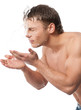 Young man wash face