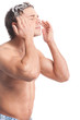 Young man wash face