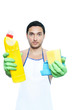 man in apron holding cleaning sponge and bottle on white