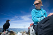 Hiker an Bird on the top of the mountain