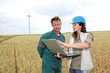 farmer and engineer wind in wheat fields