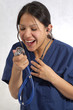 Nurse or doctor wearing scrubs and stethoscope Nurse or doctor wearing scrubs and stethoscope