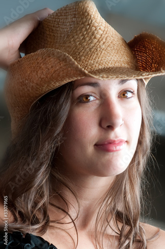 Photo: Beautiful woman with cowboy hat Beautiful woman with cowboy hat