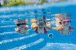 Underwater family in swimming pool