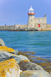 LIGHTHOUSE AT HOWTH HARBOR IN IRELAND