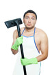 Sad young man in apron holding vacuum cleaner brush