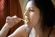 Indian Girl eating rice Indian Girl eating rice