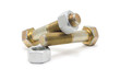 Nut screwed on a bolt on a white background
