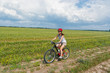 Woman having bicycle trip outdoors