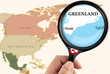 Magnifying glass over a map of Greenland Magnifying glass over a map of Greenland