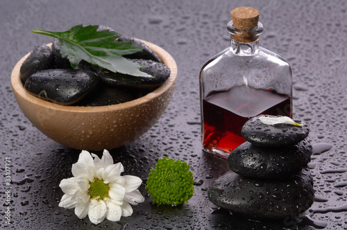 Photo: balanced stones and essential oil balanced stones and essential oil