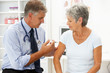 Doctor with female patient