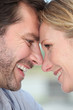 Closeup of a loving couple touching heads