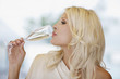 Woman drinking champagne