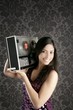 Retro open reel tape recorder beautiful brunette Dj