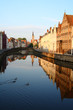 Jan van Eyckplein: old town of Bruges in Belgium at sunset time