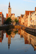 Jan van Eyckplein: old town of Bruges in Belgium at sunset time