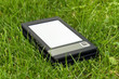 E-Book Reader in the grass E-Book Reader in the grass
