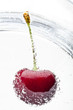 Heap of cherries in water with bubbles Heap of cherries in water with bubbles