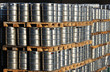 many steel kegs of beer in warehouse