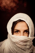 Beautiful headshot of woman wearing head scarf or veil Beautiful headshot of woman wearing head scarf or veil